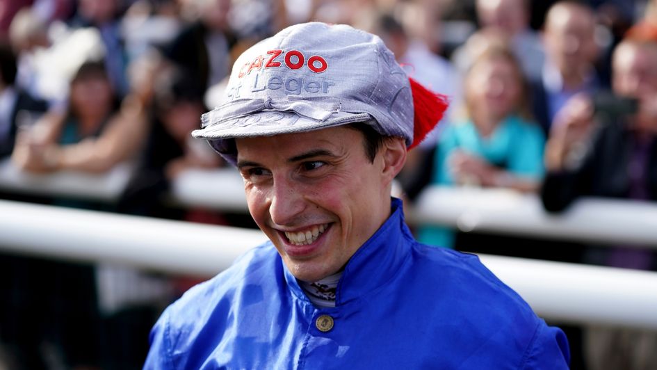 William Buick celebrates winning the Leger on Hurricane Lane