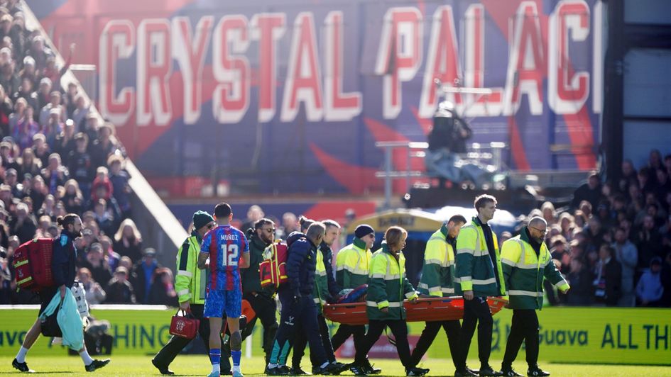 Jean-Philippe Mateta is stretchered off the field