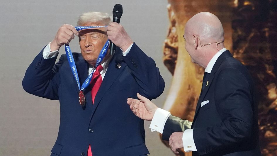 US president Donald Trump is presented with the inaugural FIFA Peace Prize by FIFA president Gianni Infantino during the 2026 FIFA World Cup draw at the Kennedy Center
