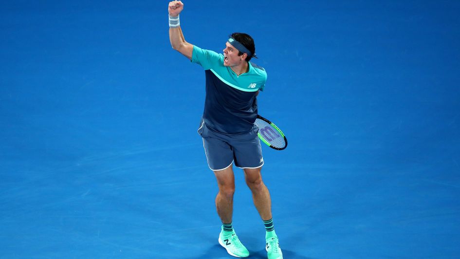 Milos Raonic celebrates match point at the Australian Open