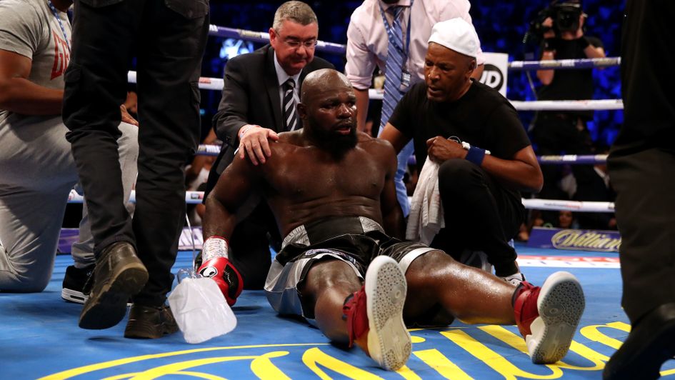 Carlos Takam after he was knocked out by Dereck Chisora