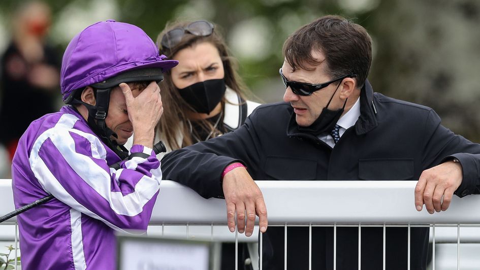 Aidan O'Brien (right) talks to Ryan Moore
