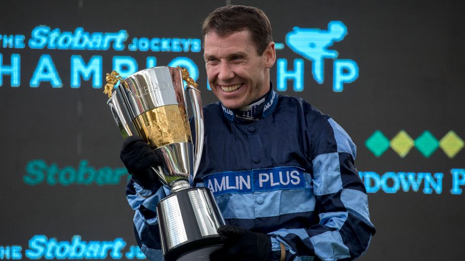 Richard Johnson pictured at Sandown Park with the jockeys' championship trophy