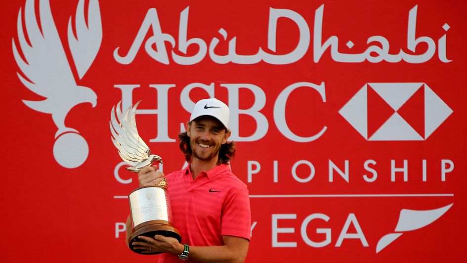 Tommy Fleetwood celebrates with the Abu Dhabi HSBC Championship trophy