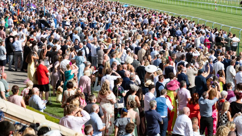 A sun-drenched Haydock crowd in August