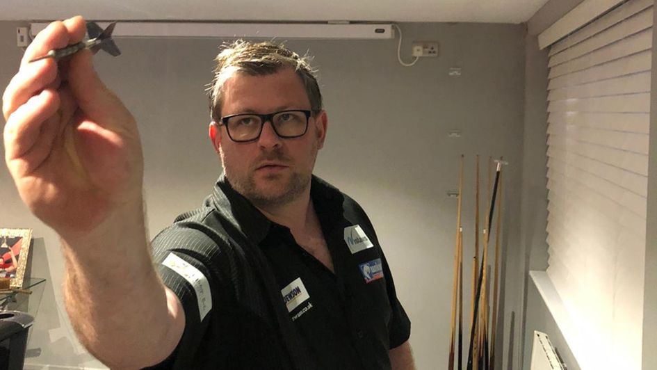 James Wade practicing right handed