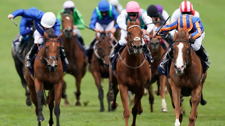 Love (far right) wins the 1000 Guineas
