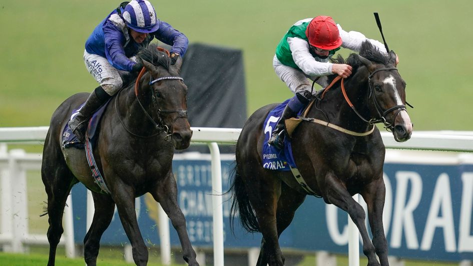 Pyledriver (right) toughs it out to win in the Epsom rain