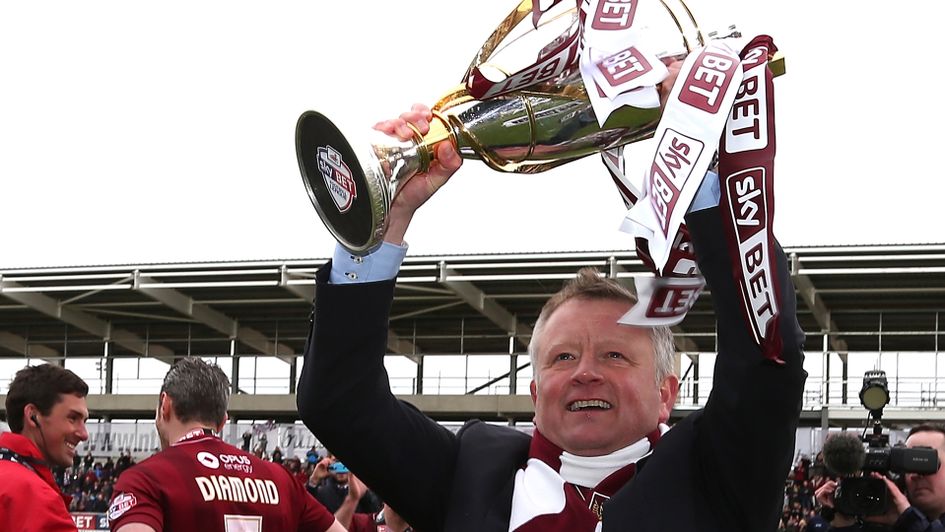 Chris Wilder with the Sky Bet League Two title following Northampton's 99-point season