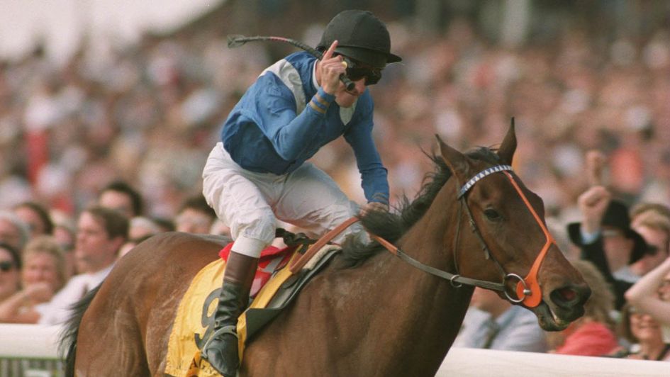 Richard Hills celebrates as Harayir wins the 1000 Guineas
