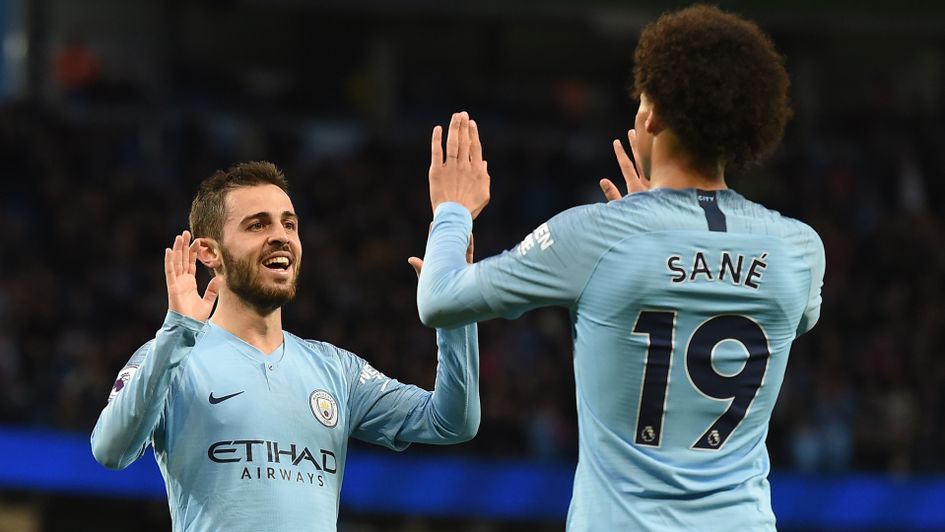 Bernardo Silva and Leroy Sane celebrate