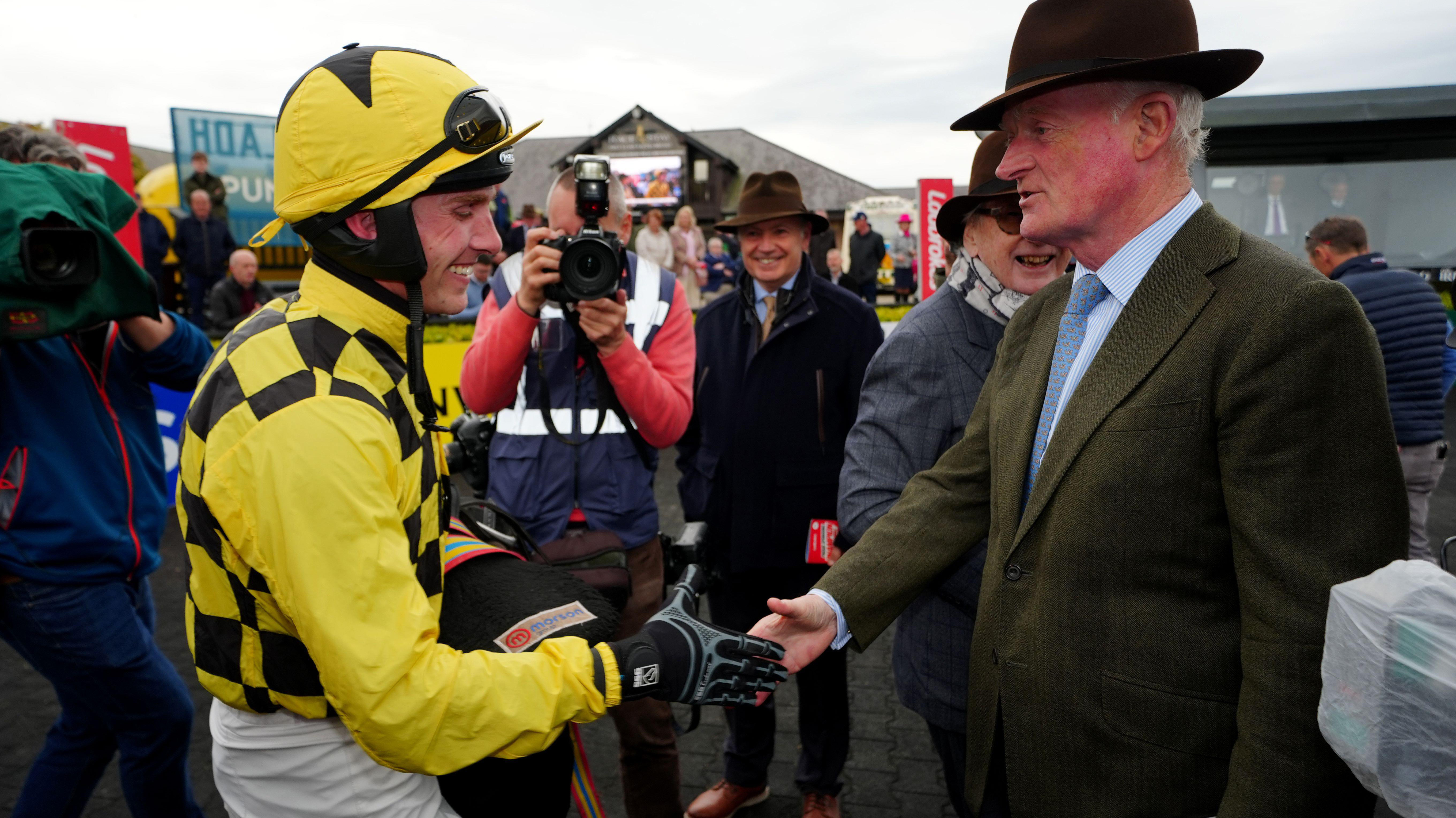 Harry Cobden and Willie Mullins shake hands