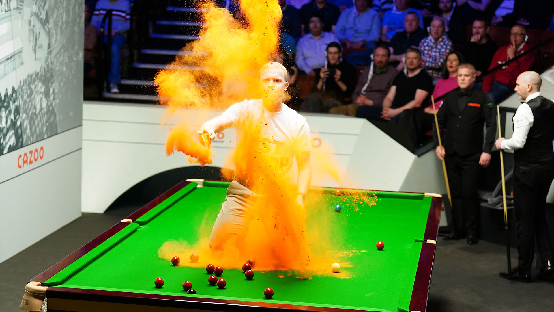 Protesters storm World Snooker Championship to cover Crucible tables in orange powder