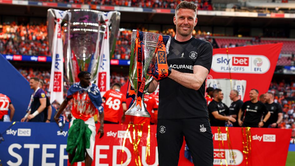 Rob Edwards manager of Luton Town celebrates with the Sky Bet Championship Play-off Final Trophy